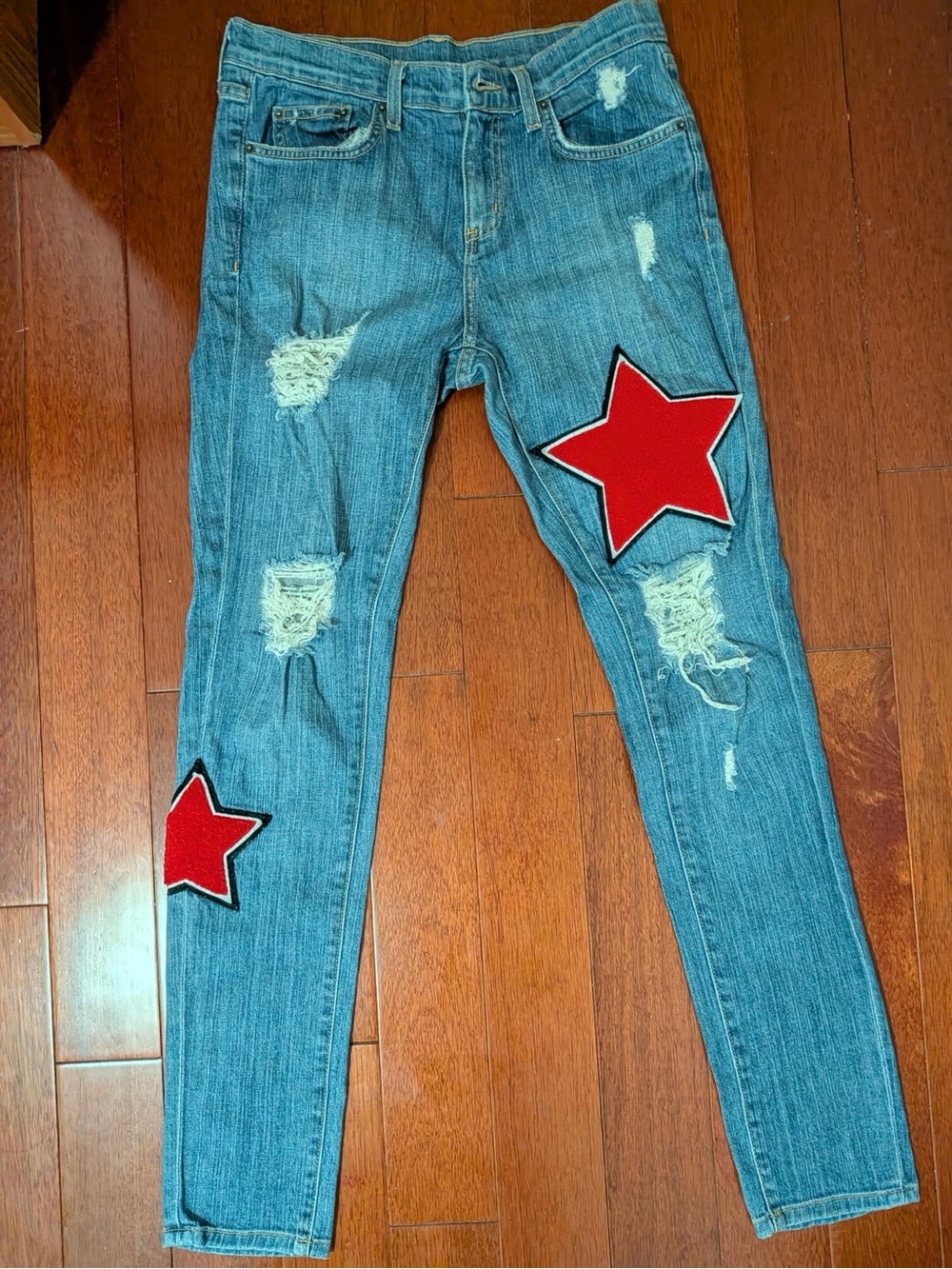 Carmar Women’s Distressed Blue Jeans with Red Star Patches
